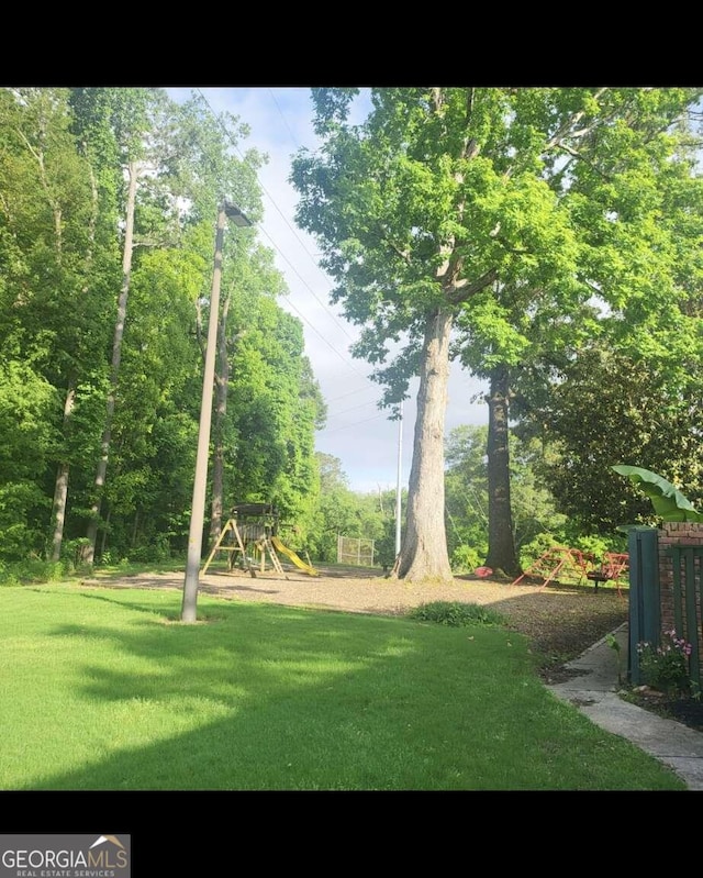 view of yard featuring a playground