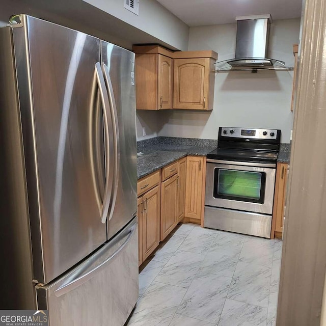 kitchen with dark stone countertops, stainless steel appliances, and range hood