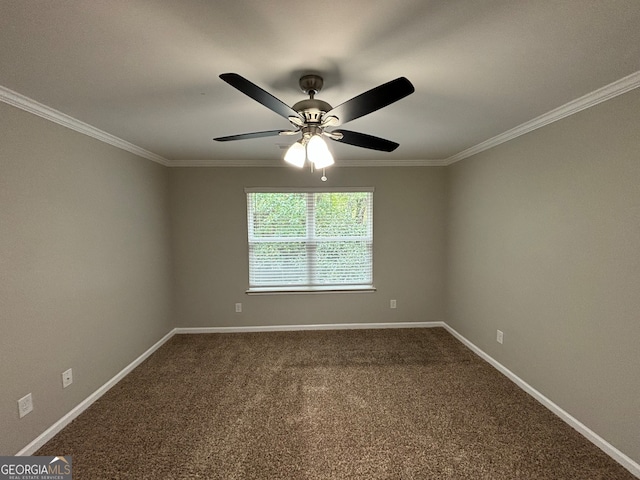 carpeted empty room featuring ornamental molding and ceiling fan