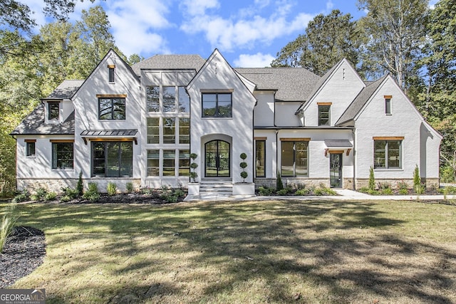 view of front of home with a front yard