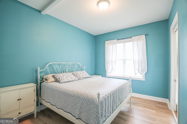 bedroom with light hardwood / wood-style floors