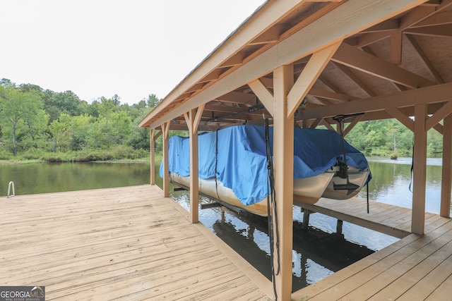 dock area featuring a water view