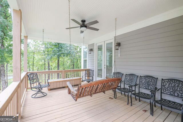 wooden terrace with ceiling fan