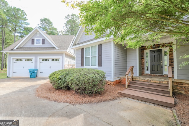 view of front facade with a porch and a garage