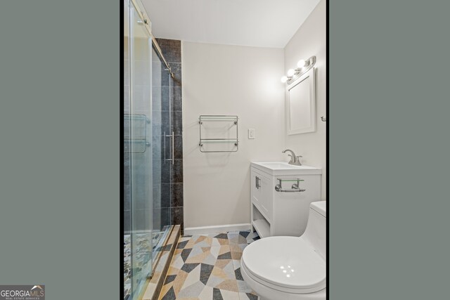 bathroom featuring tile patterned floors, walk in shower, vanity, and toilet