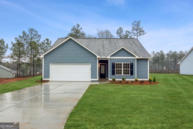 view of front facade featuring a front yard and a garage