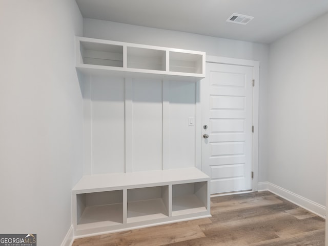 mudroom featuring wood-type flooring