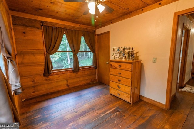 bedroom with ceiling fan, wooden ceiling, and dark hardwood / wood-style flooring