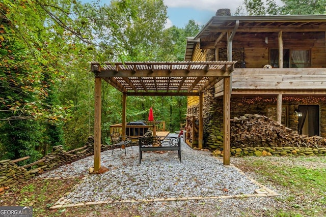 view of patio featuring a pergola