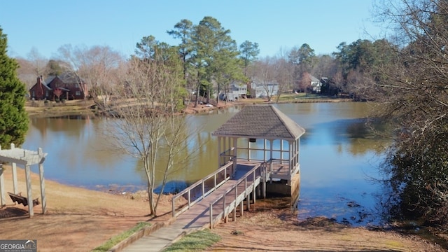 view of dock with a water view