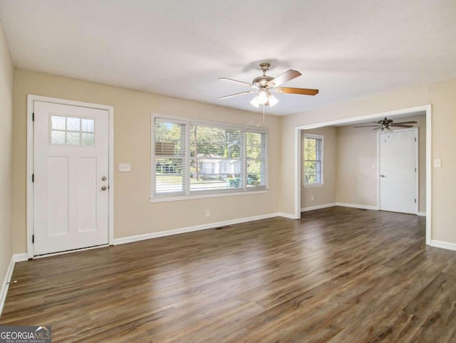 foyer entrance featuring dark hardwood / wood-style flooring and ceiling fan