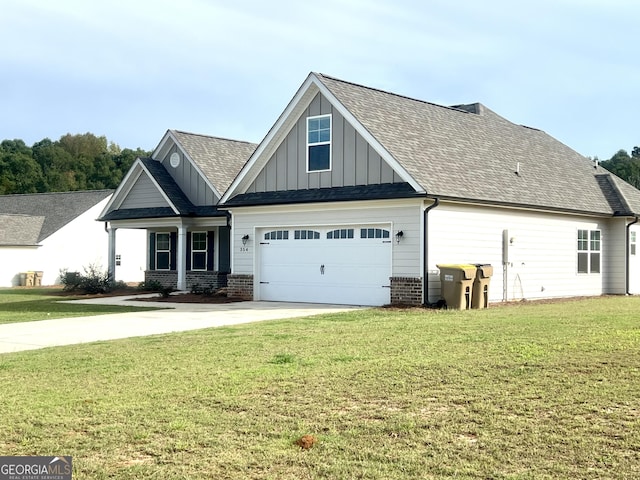 craftsman-style home with a garage and a front yard