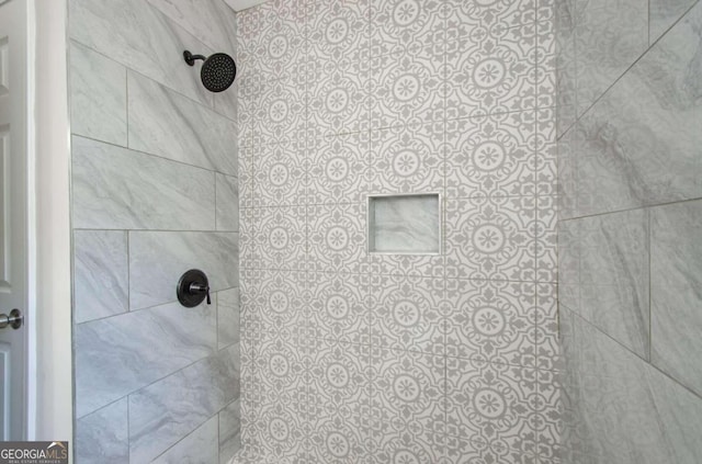 details with a tile shower