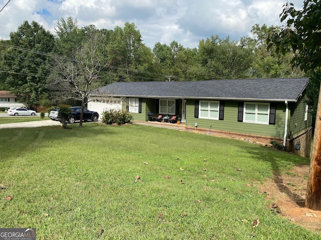 ranch-style house with a front yard