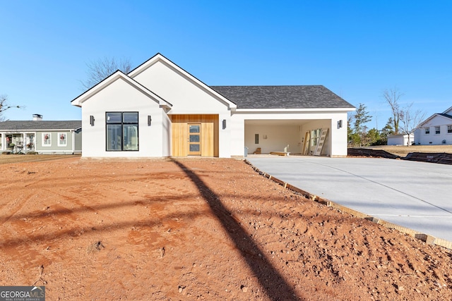 view of front facade with a carport