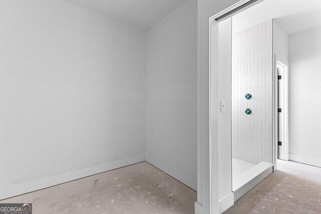 bathroom featuring concrete flooring