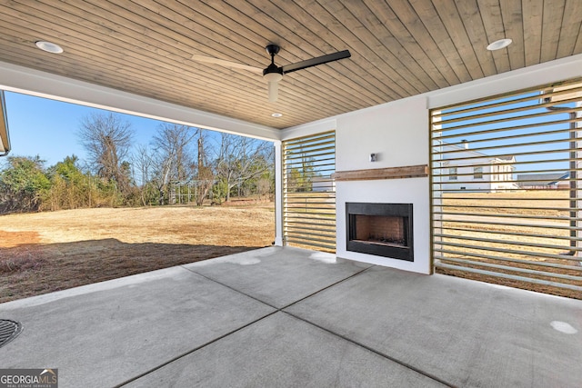 view of patio featuring ceiling fan