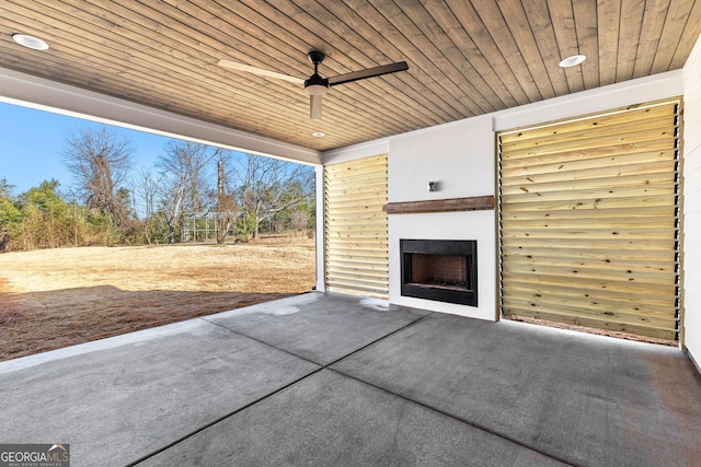 view of patio / terrace featuring ceiling fan