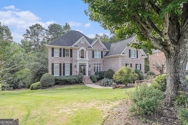 view of front facade with a front lawn