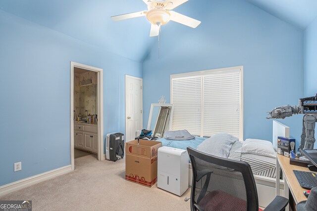 office with lofted ceiling, ceiling fan, and light colored carpet