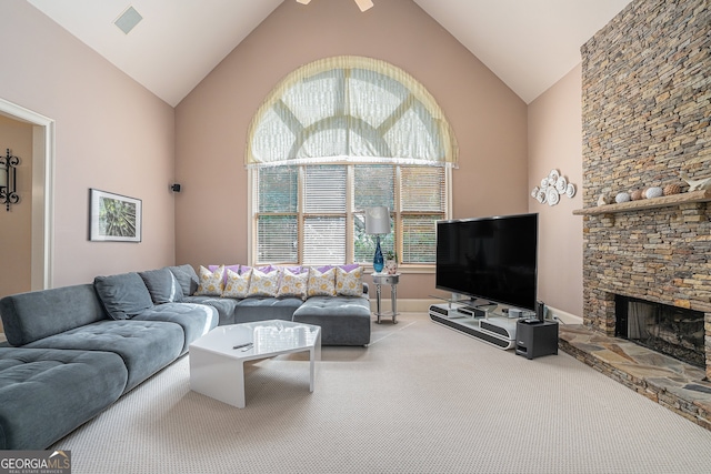 living room featuring carpet floors, a fireplace, high vaulted ceiling, and ceiling fan