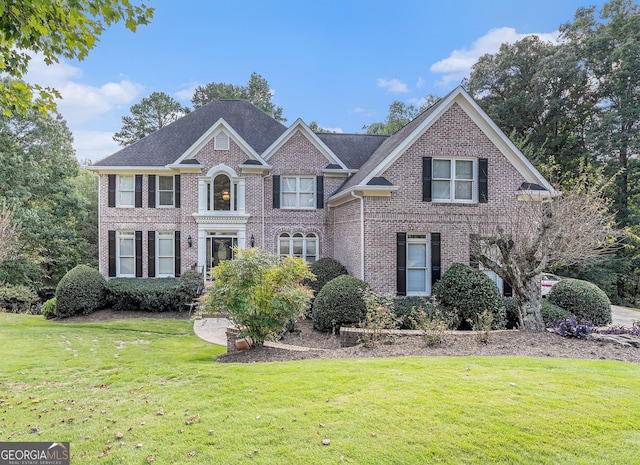 view of front of property with a front lawn