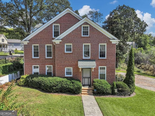 view of front of house with a front lawn