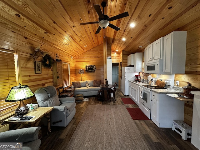 living area with ceiling fan, dark wood finished floors, wooden walls, wood ceiling, and lofted ceiling