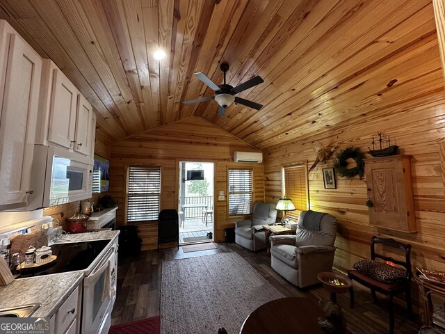 living room featuring a ceiling fan, vaulted ceiling, wood walls, dark wood-style flooring, and an AC wall unit