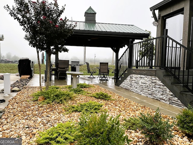 view of patio / terrace with a gazebo