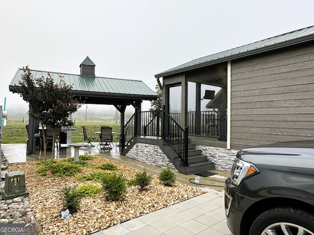 view of patio / terrace featuring a gazebo