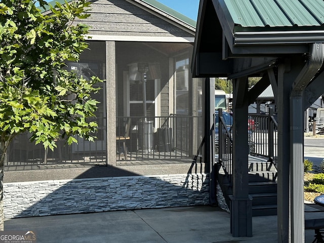 exterior space with a sunroom