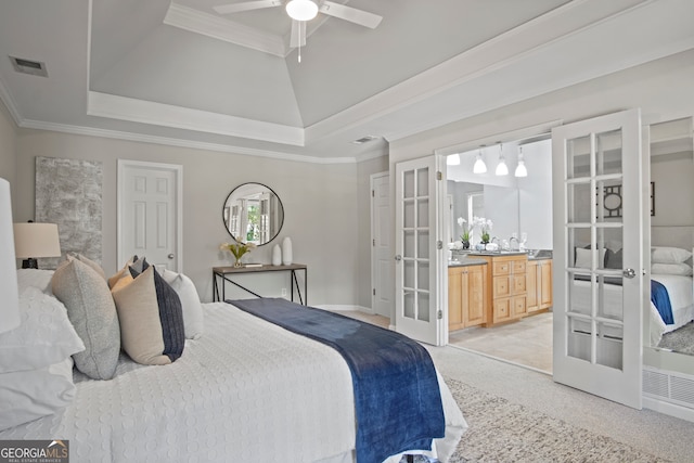 bedroom with ornamental molding, a tray ceiling, ceiling fan, and french doors