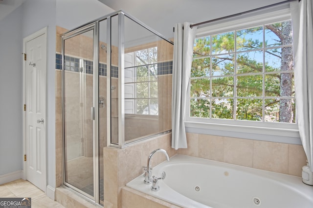 bathroom with plus walk in shower and tile patterned floors