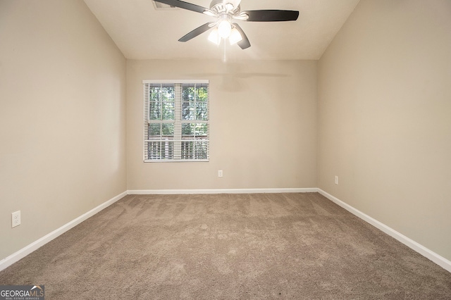 empty room with carpet and ceiling fan