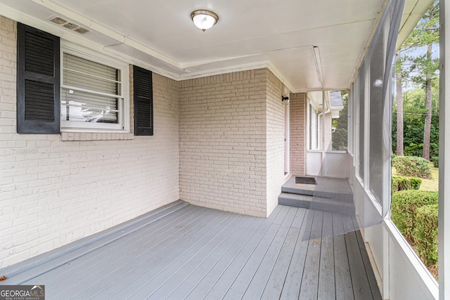 wooden deck with a porch