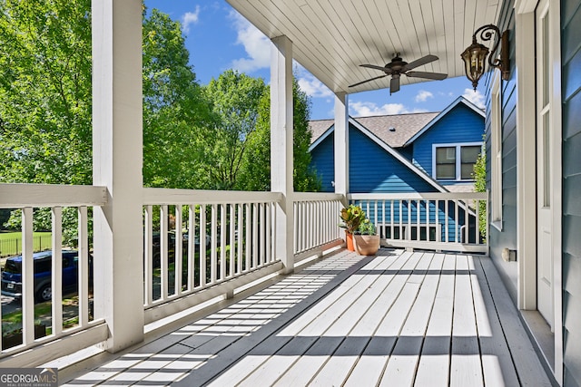 wooden terrace with ceiling fan