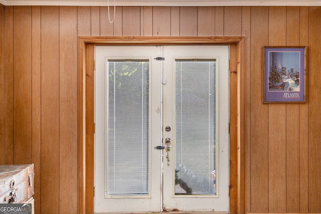 interior space featuring wood walls