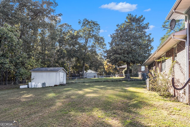 view of yard with a storage shed