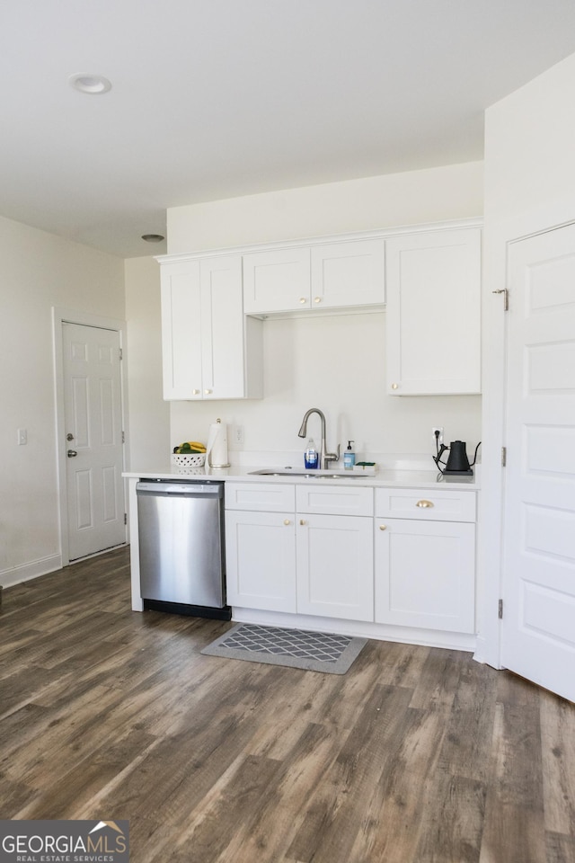 kitchen featuring white cabinetry, sink, and stainless steel dishwasher