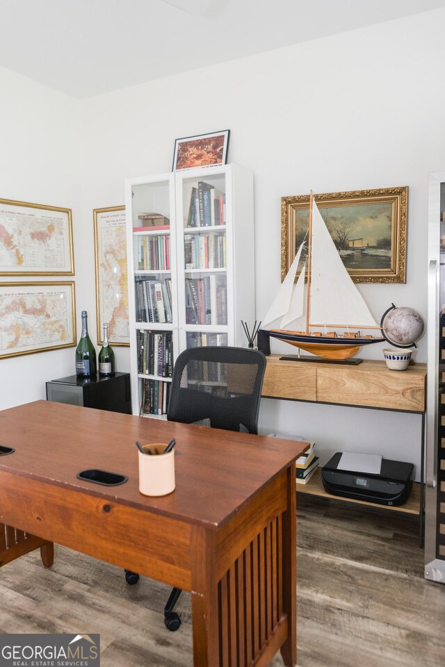 office space featuring hardwood / wood-style floors