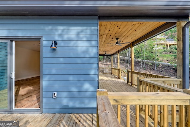 wooden deck with ceiling fan