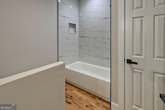 bathroom with hardwood / wood-style floors