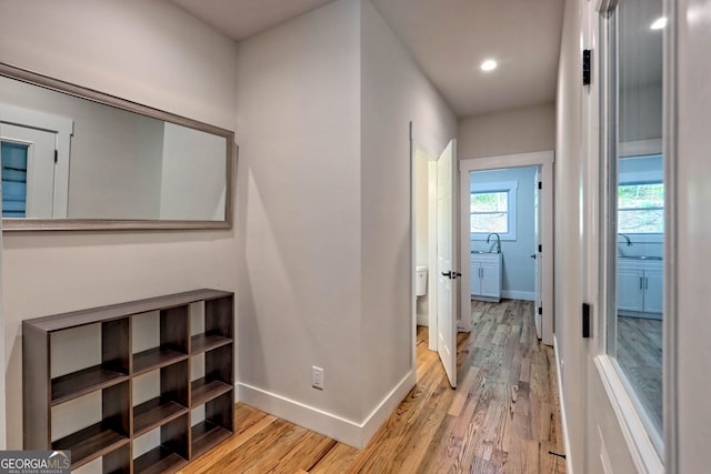 hallway featuring light hardwood / wood-style floors