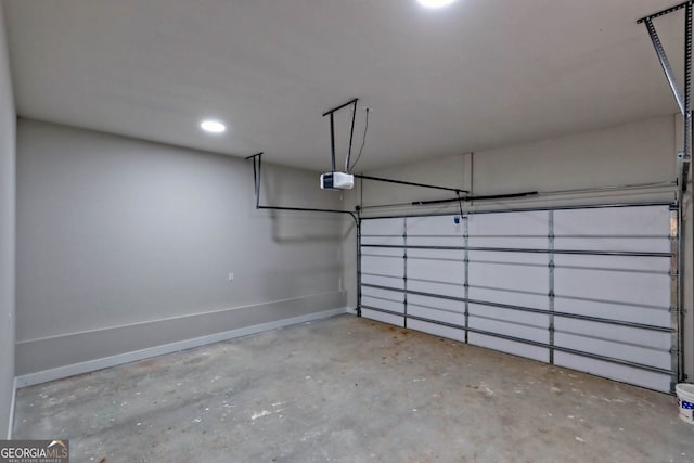 garage featuring a garage door opener