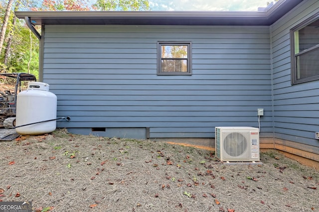 view of home's exterior featuring ac unit