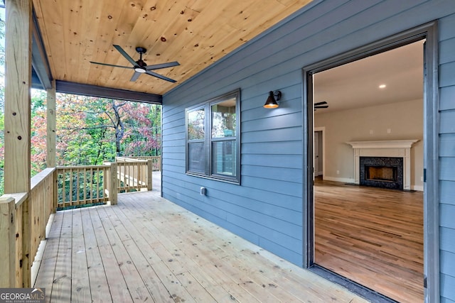 wooden terrace with ceiling fan