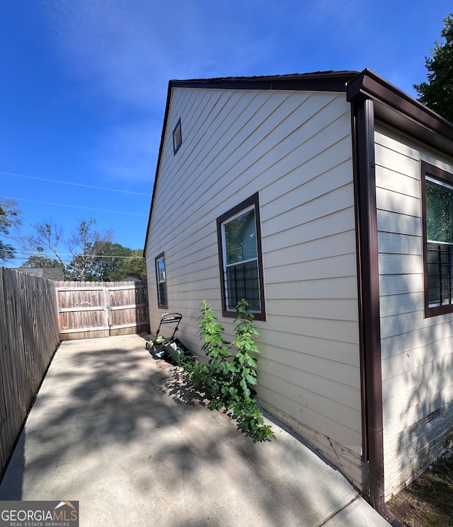 view of property exterior featuring a patio