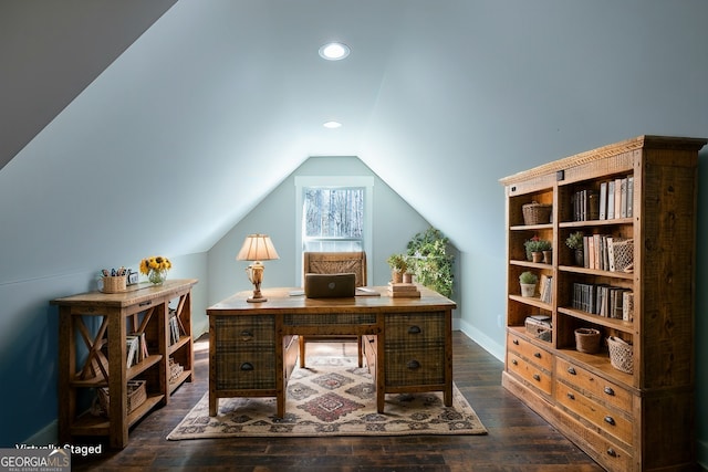 office space featuring vaulted ceiling and dark hardwood / wood-style floors