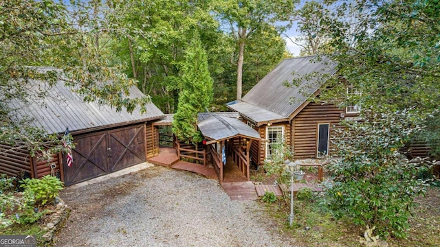 view of front facade featuring a wooden deck